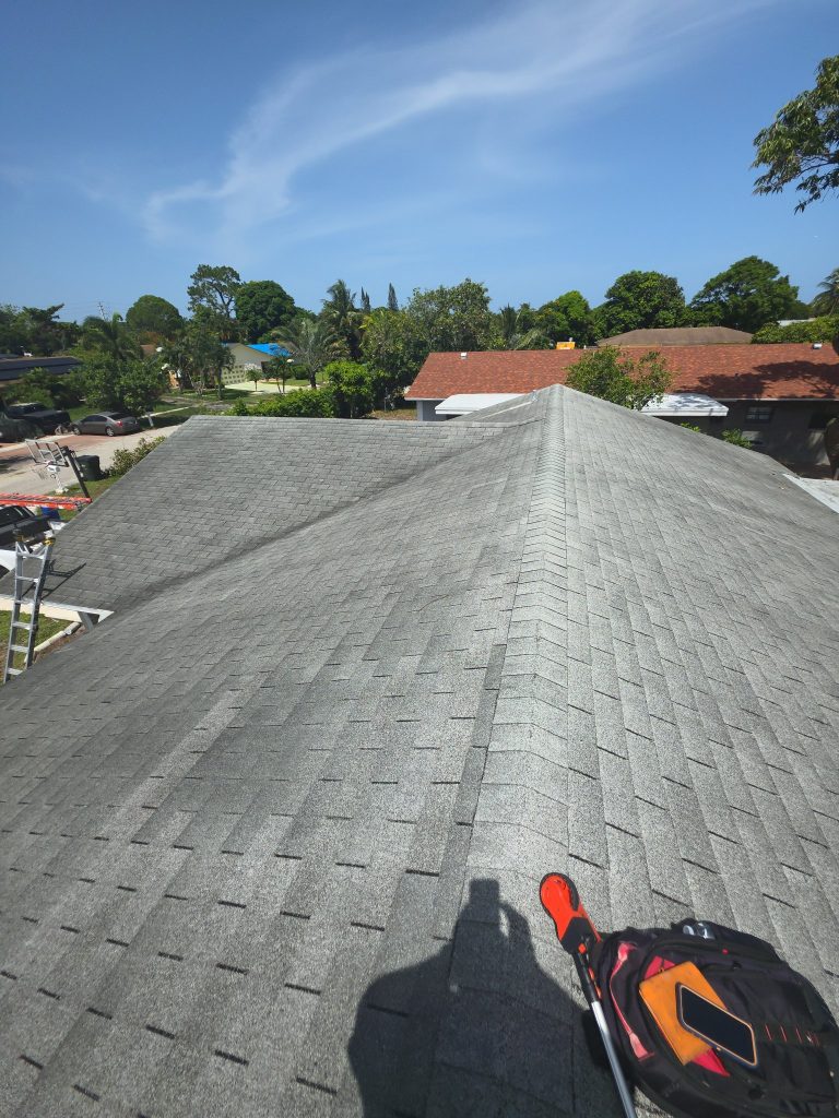 Shingle roof ridge on a South Florida home during an Onel Construction roof inspection