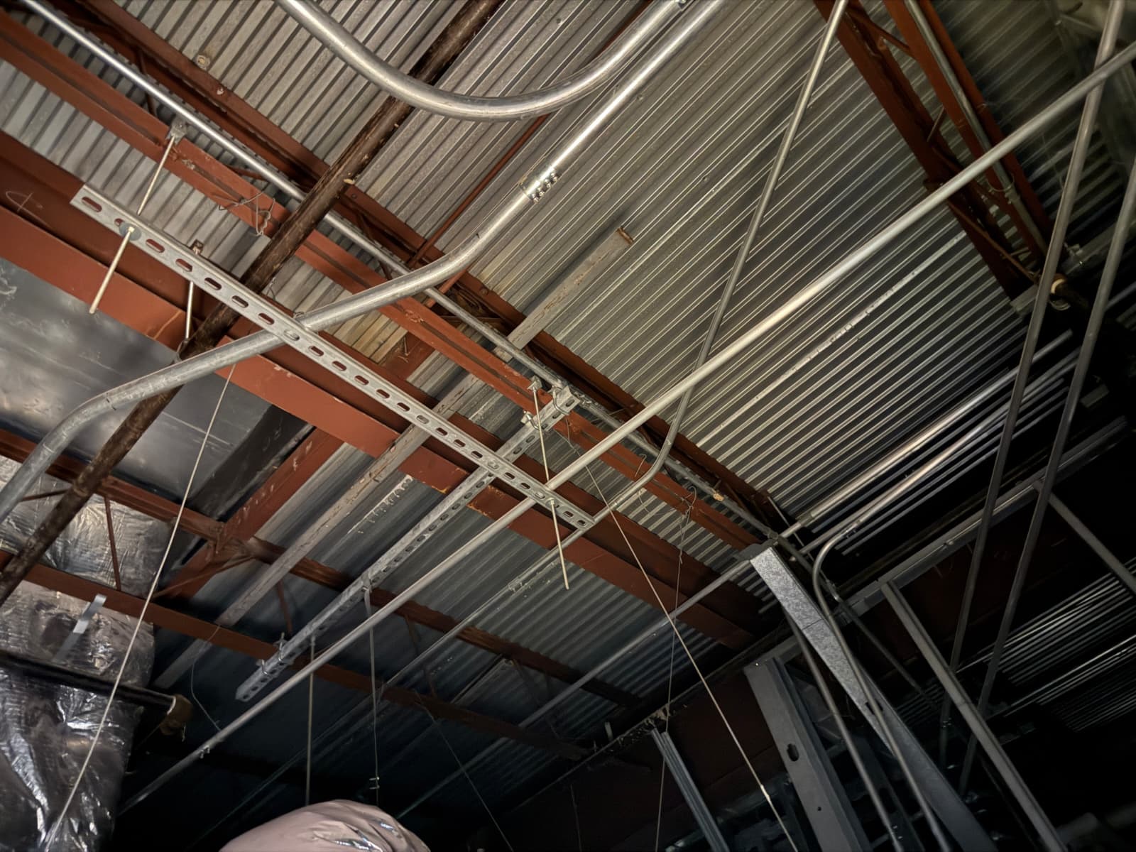 New electrical conduit runs installed during a South Florida commercial build-out